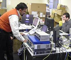Our engineer configuring Cisco and HP PoE switches.